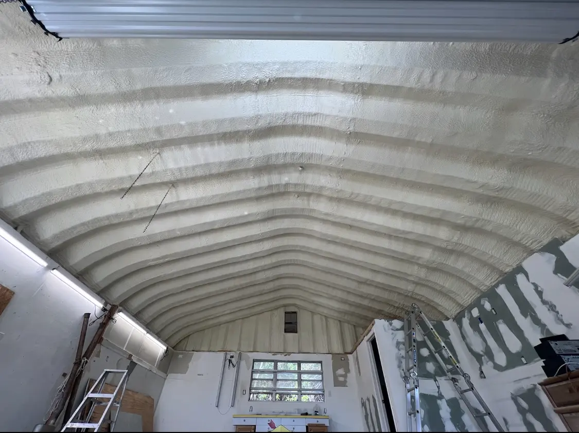 Spray polyurethane foam applied to the underside of a metal roof deck in Madison Heights